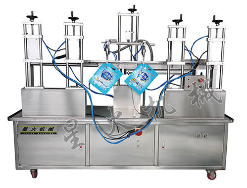自立吸嘴袋灌装旋盖机-双头灌装旋盖一体机